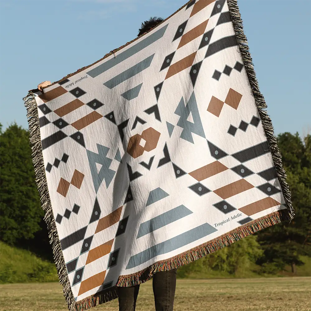 Detailed view of the Wandering Warrior Blanket, showcasing the intricate geometric pattern and woven texture.