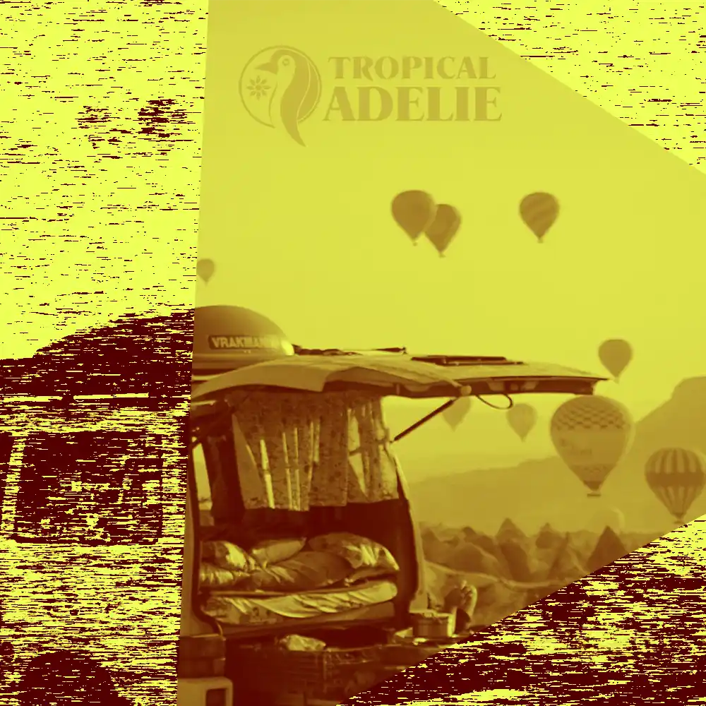 A yellowish photo of a camper parking next to the cliff with an open back, hot air ballons are flying in the background. With the logo of Tropical Adelie.